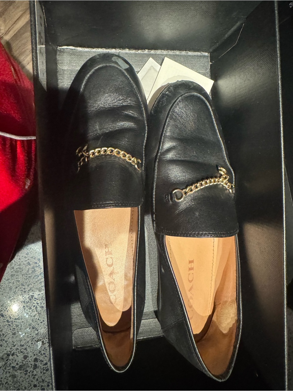 Coach Black Leather Loafers with Gold Chain Accent